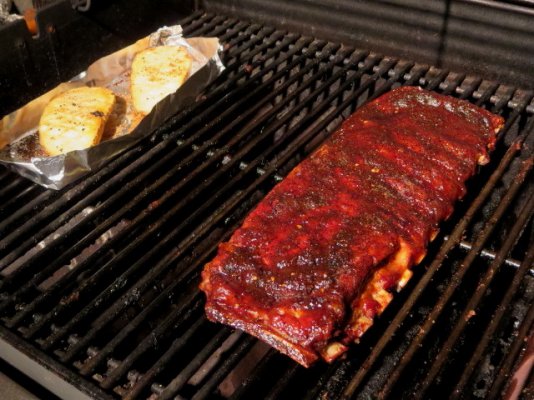 ribs and potatoes on grill.jpg