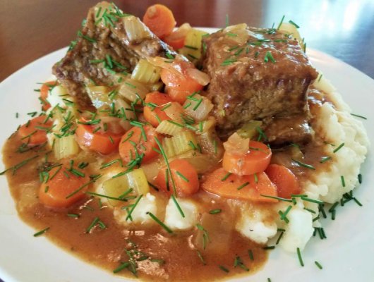 smothered short ribs over mashed.jpg
