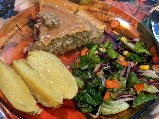 Tourtière, fingerling potato, and a salad with homemade vinaigrette.jpg
