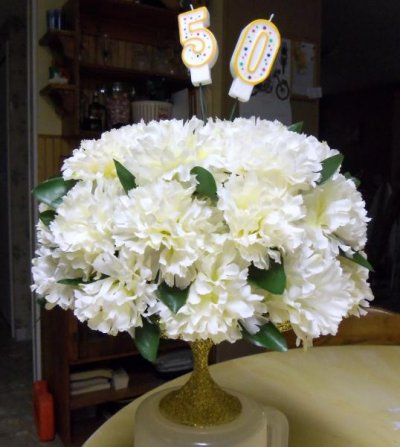 Carnation cake on pedestal.jpg