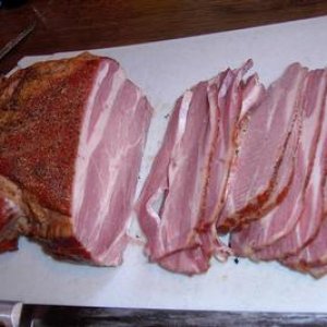 This is the Buckboard Bacon I made, out of the smoke and after cooling off a bit (Easier to slice). 

I'm out of it, so I need to make more...

John