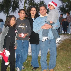 Our kids, Justin, Amanda and Christopher, my husband, Carlos and I