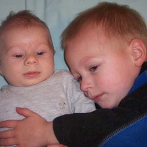 Aidan tells me "Callum, brand new!"  These are my boys hanging out.  Aidan is 2 and Callum is 2 months.