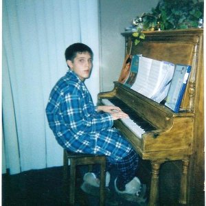 me sitting at piano before bed
