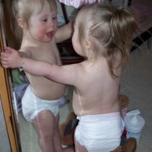 Lil miss Mayson, now 2, loves to play with that baby in the mirror!