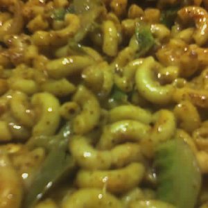 macaroni salad with taco seasoning  onions peppers and salsa / ranch dressing