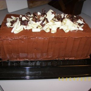 Decadent layers of dark and white chocolate ganache and dark chocolate cake. Original recipe from Food & Wine.