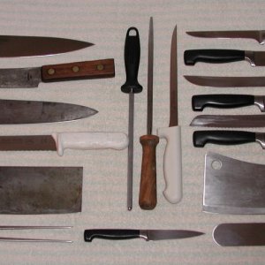 This is a photo of all of my kitchen knives as of October 7, 2008.  Pretty motley group, huh?