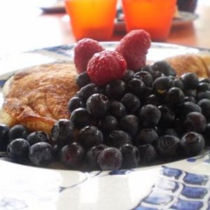 here a picture on some pancakes with wild raspberries, blueberries and maplesyrup!