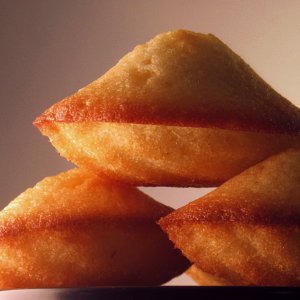 Here is my recipe http://poppycooking.blogspot.com/2011/10/madeleines.html
For classic french Madeleine, with a light taste of lemon