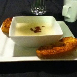 This is cream of potato soup with bacon bits, and a side of garlic bread I made at home. It was delicious. :)