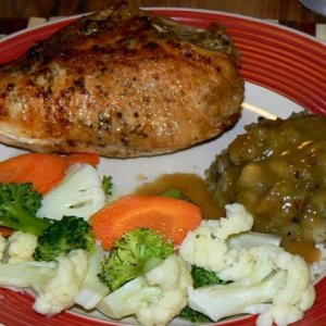 Roast chicken breast, gravy, stuffing and steamed fresh veggies.