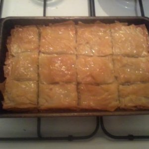 Baklava - Sweet Pastry - Turkish/Albanian/Greek

Rich,sweet pastry made of layers of filo pastry filled with chopped nuts and sweetened with syrup or 
