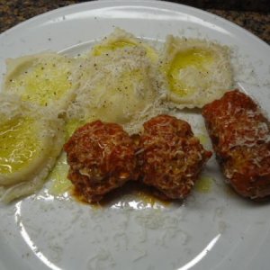 Homemade Ravs and Meatballs with a piece of Italian Sausage
