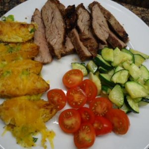Grilled Flank Steak, roasted Cheese Potatoes and toamto&cucumber salad