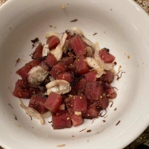 Hawaiian-Style Ahi (Tuna) Poke.  I add Sweet White Onion, Seaweed, Chili Flakes, Soy Sauce, Rock Salt and Inamona or crushed Kukui Nut.