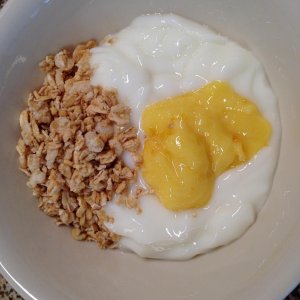 I eat this NOT DH! 
Vanilla Yogurt with some Granola and homemade Meyer Lemon Curd.
MMM!