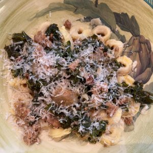 Cheese Tortellini topped with Sweet Italian Sausage and Kale, MMM!