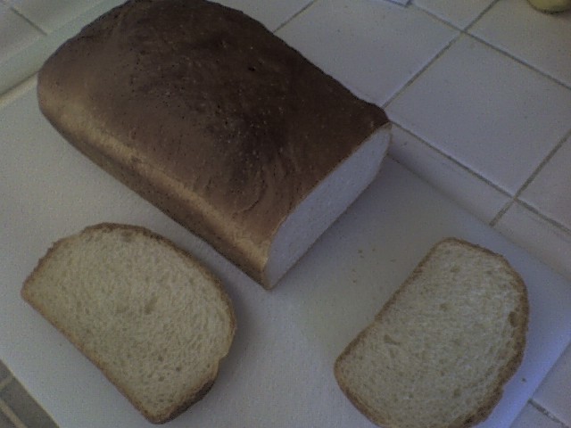 A loaf of bread I baked this week. I got the recipe from "the bread bible" and I believe it was their "basic white bread". Came out good, can't wait t