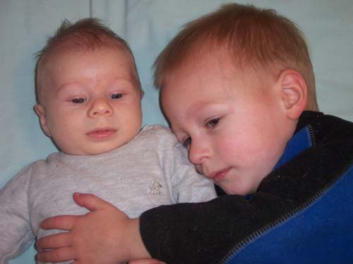 Aidan tells me "Callum, brand new!"  These are my boys hanging out.  Aidan is 2 and Callum is 2 months.