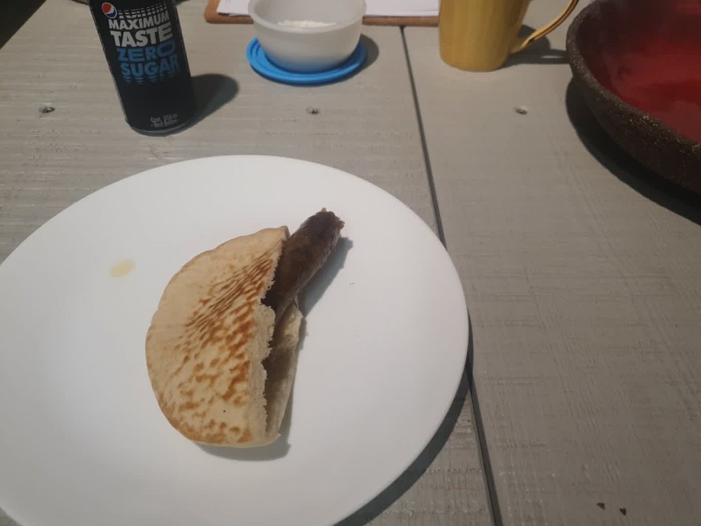 argentinian naknikia in half a pita