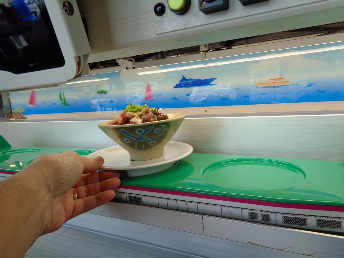 At Genki Sushi, rather than the conveyer belt method, you get your order by "Bullet Train" HA!! FUN!