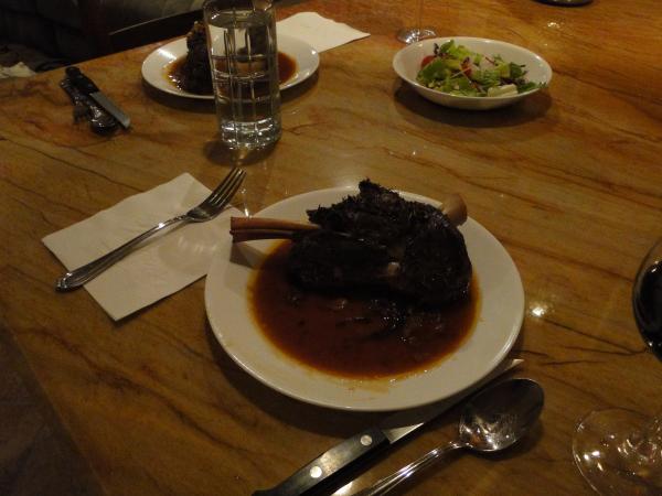 Braised lamb shanks au jus with black truffle demi-glaze