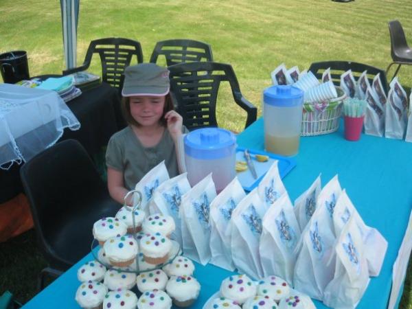 Caty's bake sale, mom ended up selling most of the stuff for her. She only lasted about 15mins!