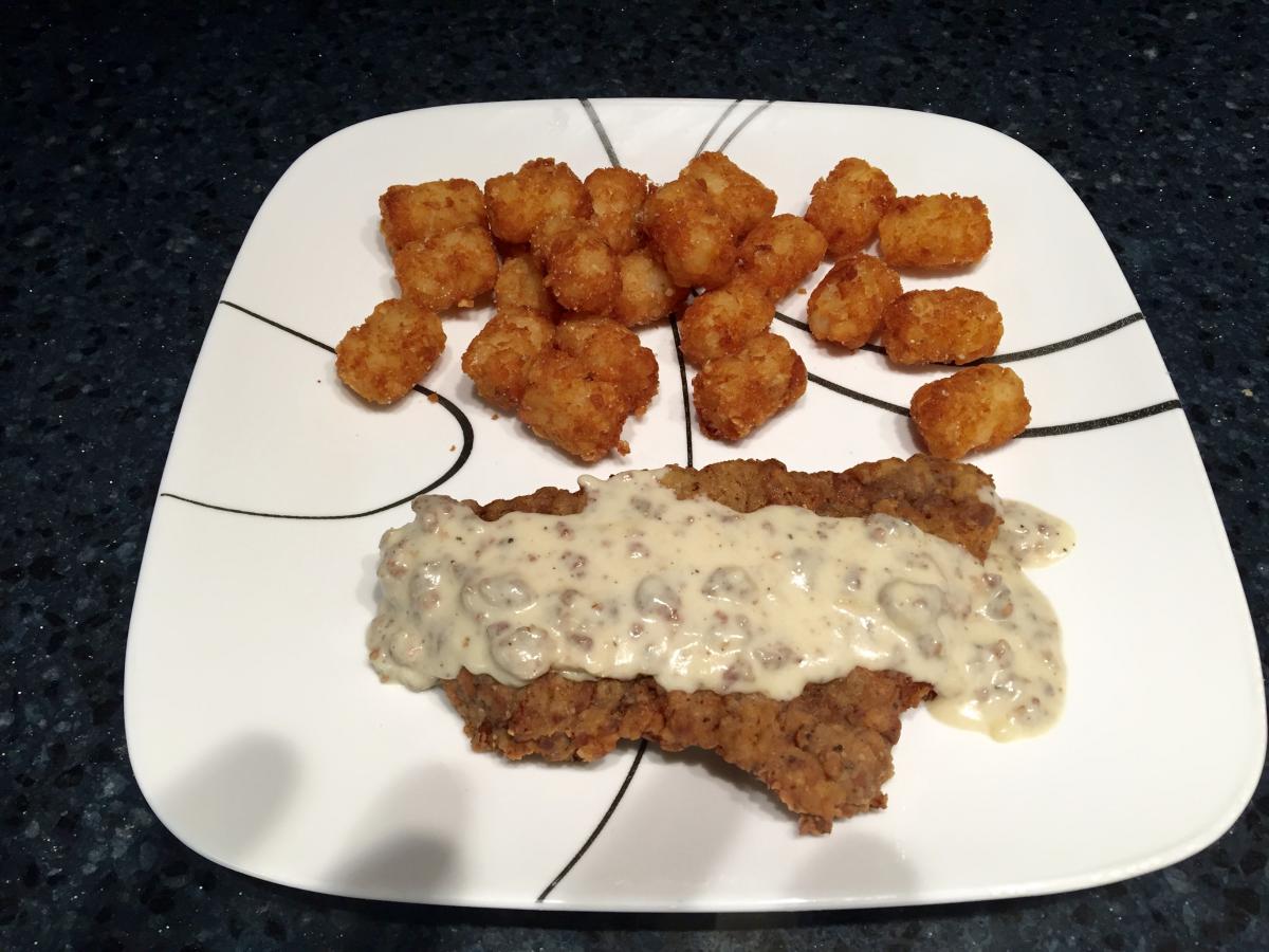 Chicken Fried Steak with Sausage Gravy and Tater Tots
