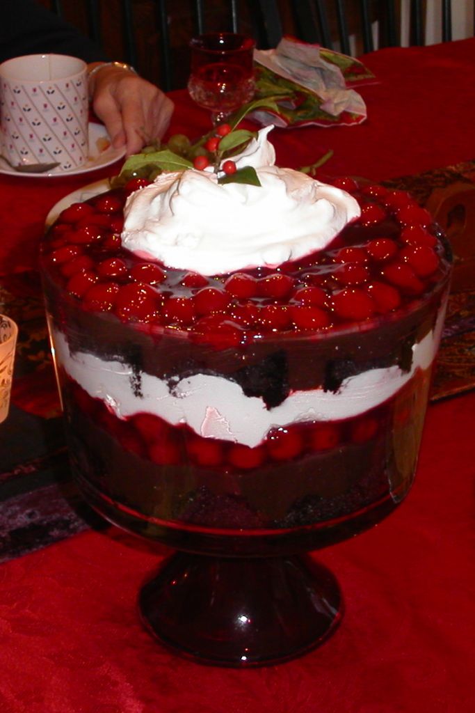 Chocolate cake, cherries and whipped cream.