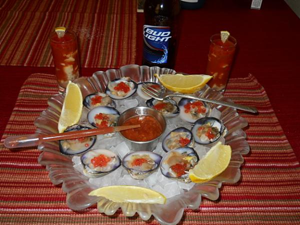 Clams on the half shell, clam shooters.