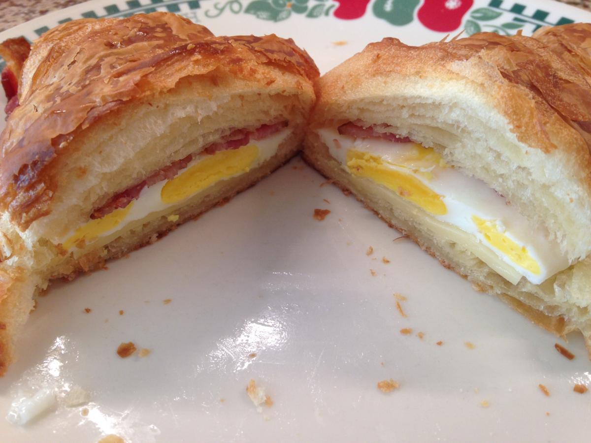Costco Croissant stuffed with fried eggs, cheese and BACON!