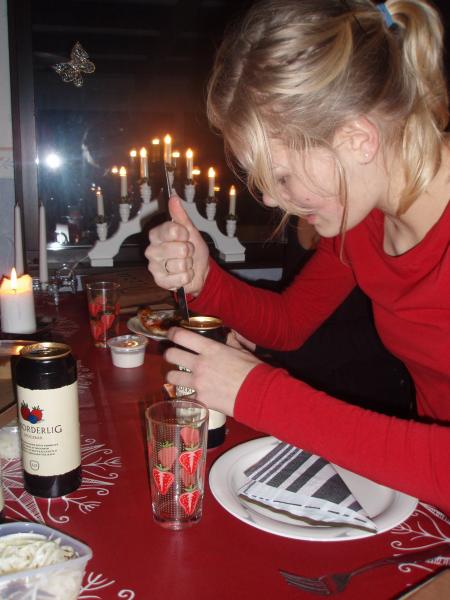December 2007
At a friend's house; pizza and parlor games. 
My friend is having a hard time opening her can of cider..
Btw, see the candlestick in the