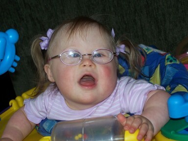 Here is MayMay (Mayson) with her glasses on.  She's playing!