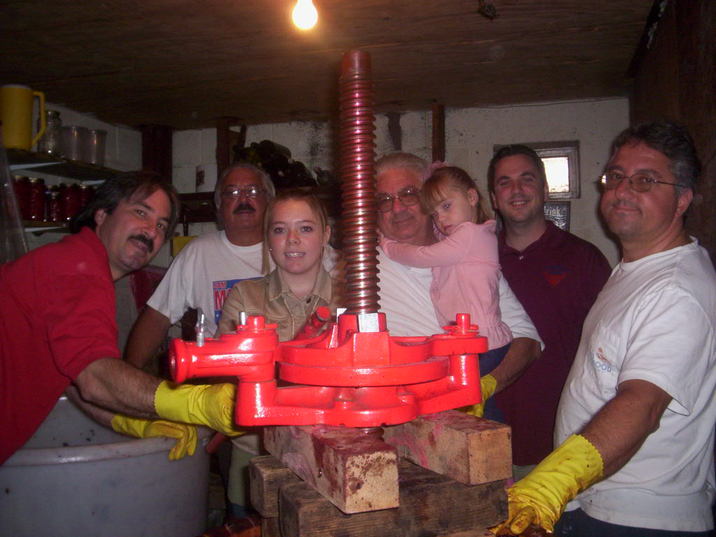Here is me and my family making wine