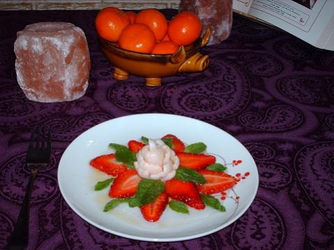 Lychee nuts, strawberries, mint leaves drizzled with White Truffle oil.  Very light and tasty!