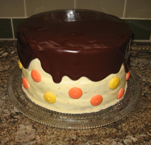 Marys Big B-Day Cake | Orange infused layer cake coated with chocolate ganache

2 buttered and floured 9 inch cake pans
oven - 375

1/2 C butter
2 egg