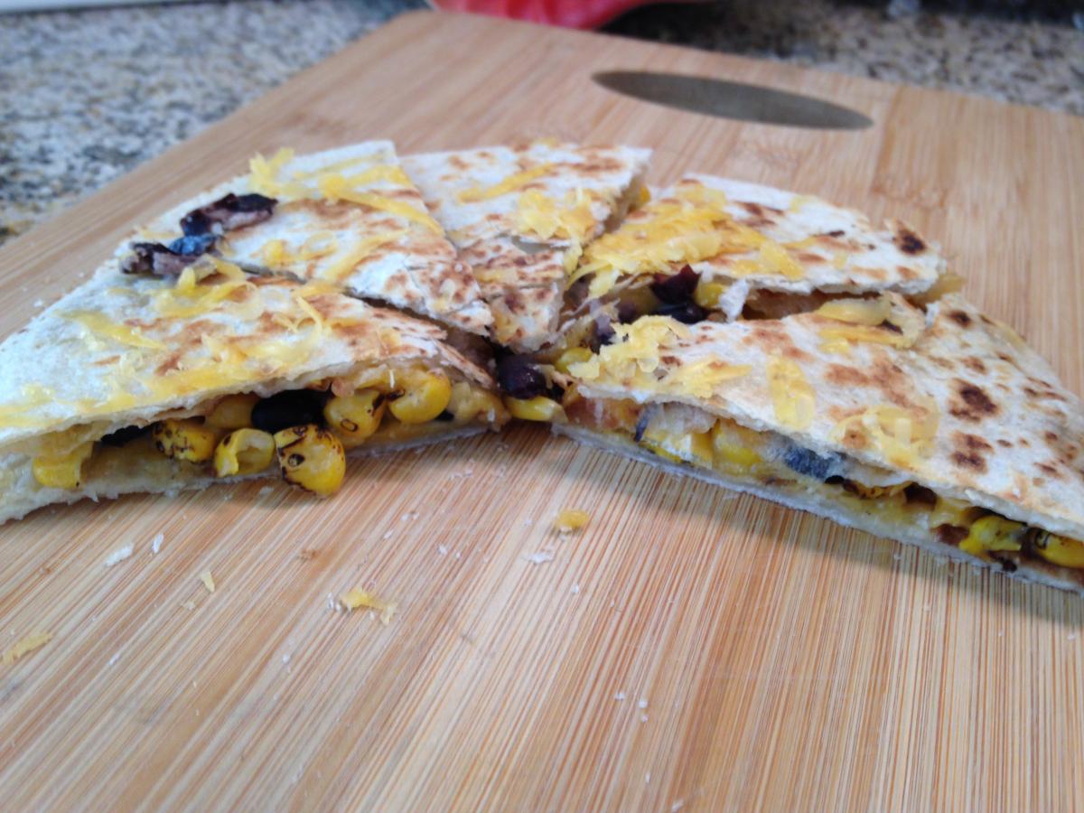 Meat-less Quesadilla.
I added Black Beans, Corn and Sharp Cheddar Cheese.
