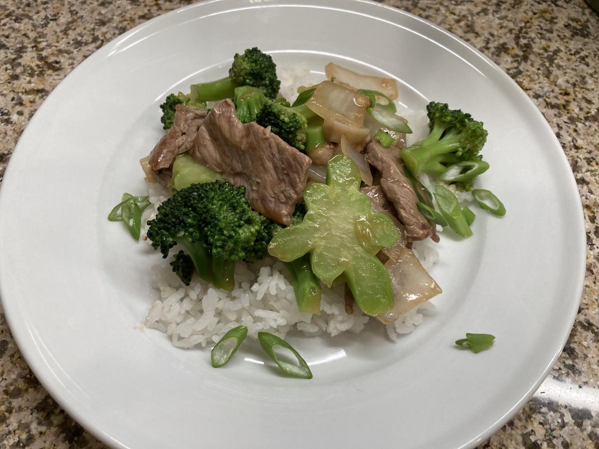 My version, Chicken Broccoli instead of Beef ... served over the every present steamed White Rice.
