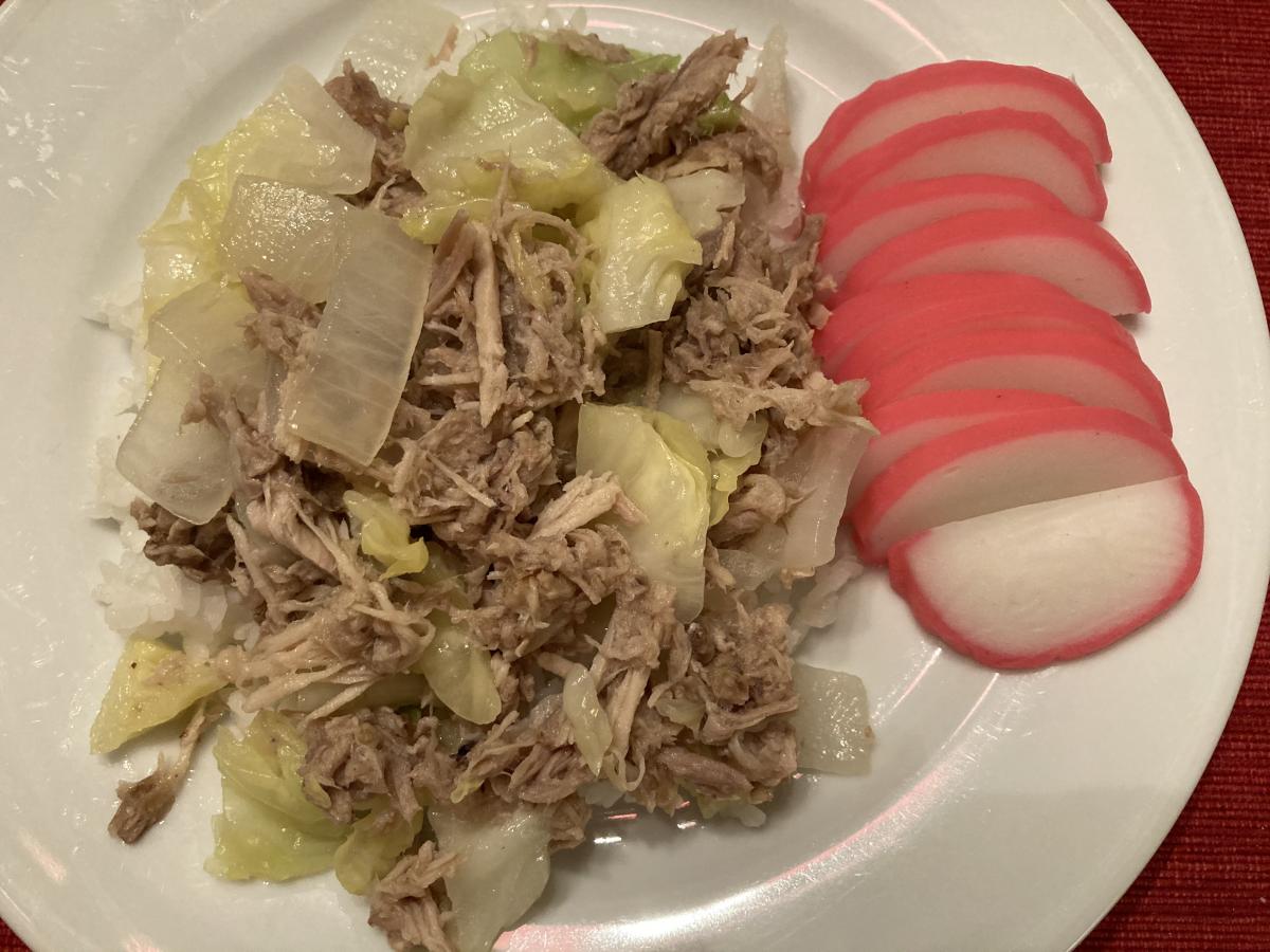 Oven Roasted Kalua Pork with Sweet White Onions and Cabbage, with a side of Kamaboko, steamed Japanese Fish Cake