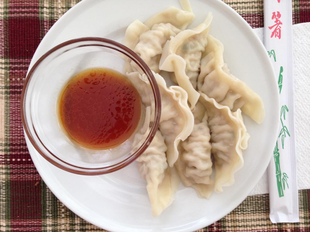 Pork & Veggie Gyoza with a Soy Sauce based dipping sauce, YUM!