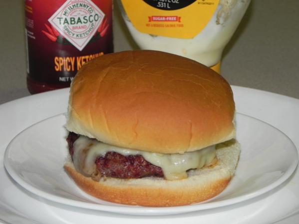 Spicy burger with pickled Jalapeno's and onions with Pepper Jack cheese