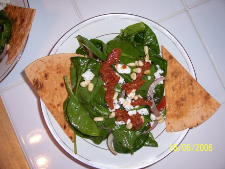 Spinach Salad w/ Sun Dried Tomatoes, Goat Cheese, Pine Nuts, & Red Onion