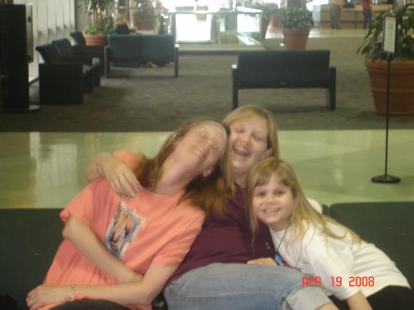 This is my mom, me and my sister at the airport the day they left to go back home.