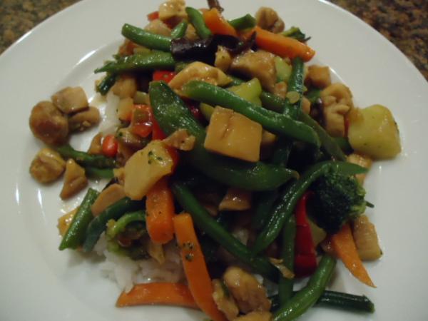 Trader Joe's Asian Stir Fry Vegetables with diced Chicken added, served over steamed white rice