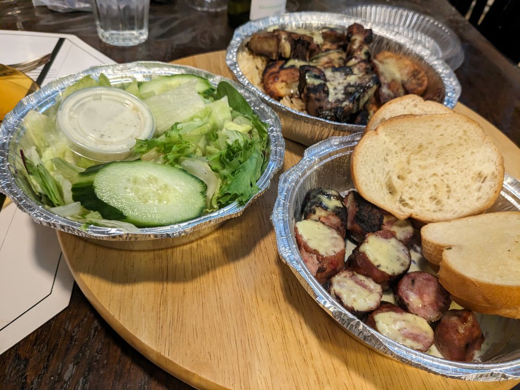 Bad boy mixed grill, salad, loukaniko, and garlic bread.jpg