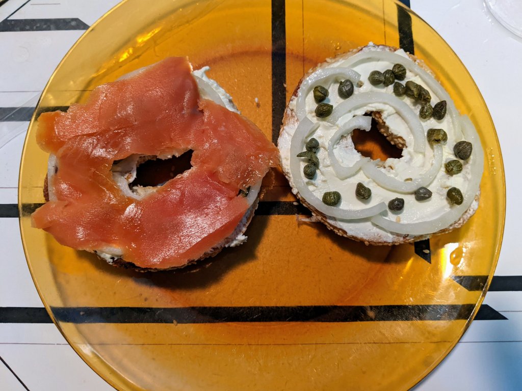 bagel with cream cheese and salmon, etc - one side fully dressed, one side before the salmon.jpg