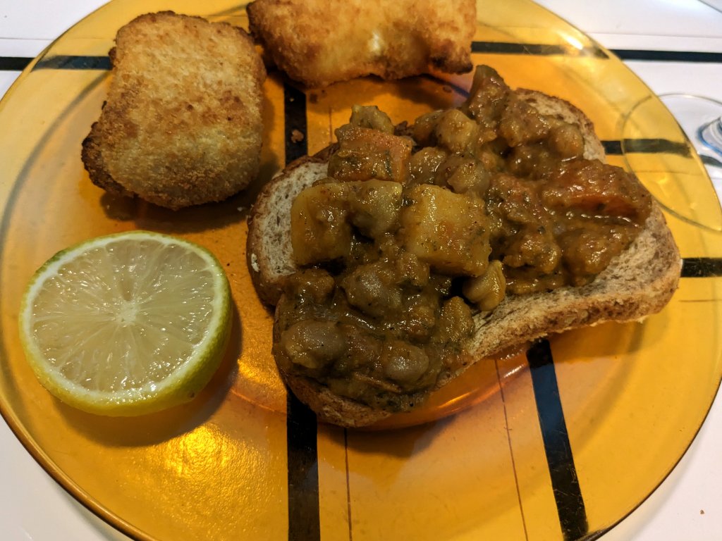 Breaded haddock and butter chickpeas on ww bread.jpg