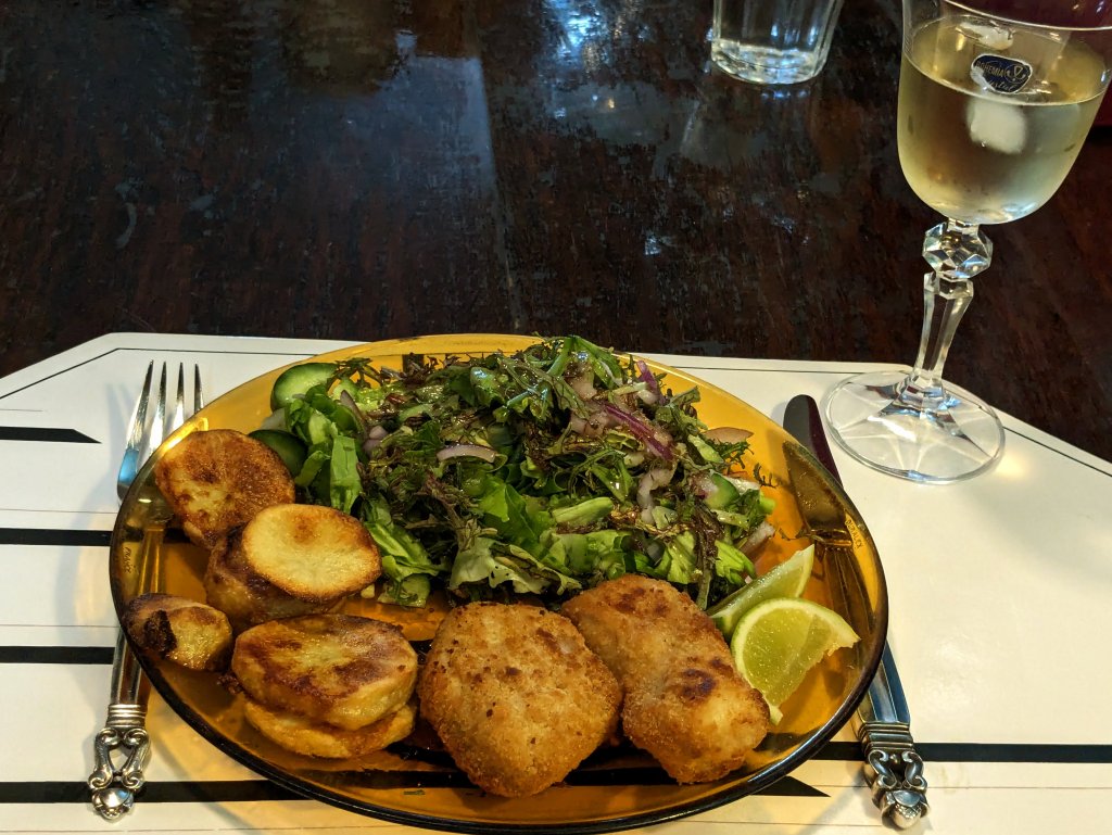 Breaded haddock, oven fried potato slices, and a salad with homemade vinaigrette.jpg