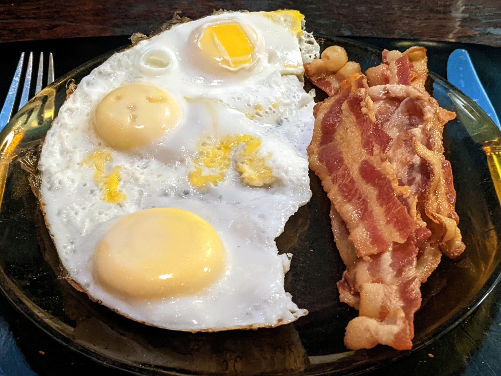 breakfast for supper - 2 duck eggs, 1 chicken egg, bacon, wholewheat toast jpg.jpg